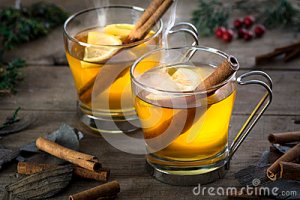 two-hot-toddy-cocktail-drinks-cinnamon-lemmon-whisky-rum-apple-brandy-set-rustic-wood-35766231
